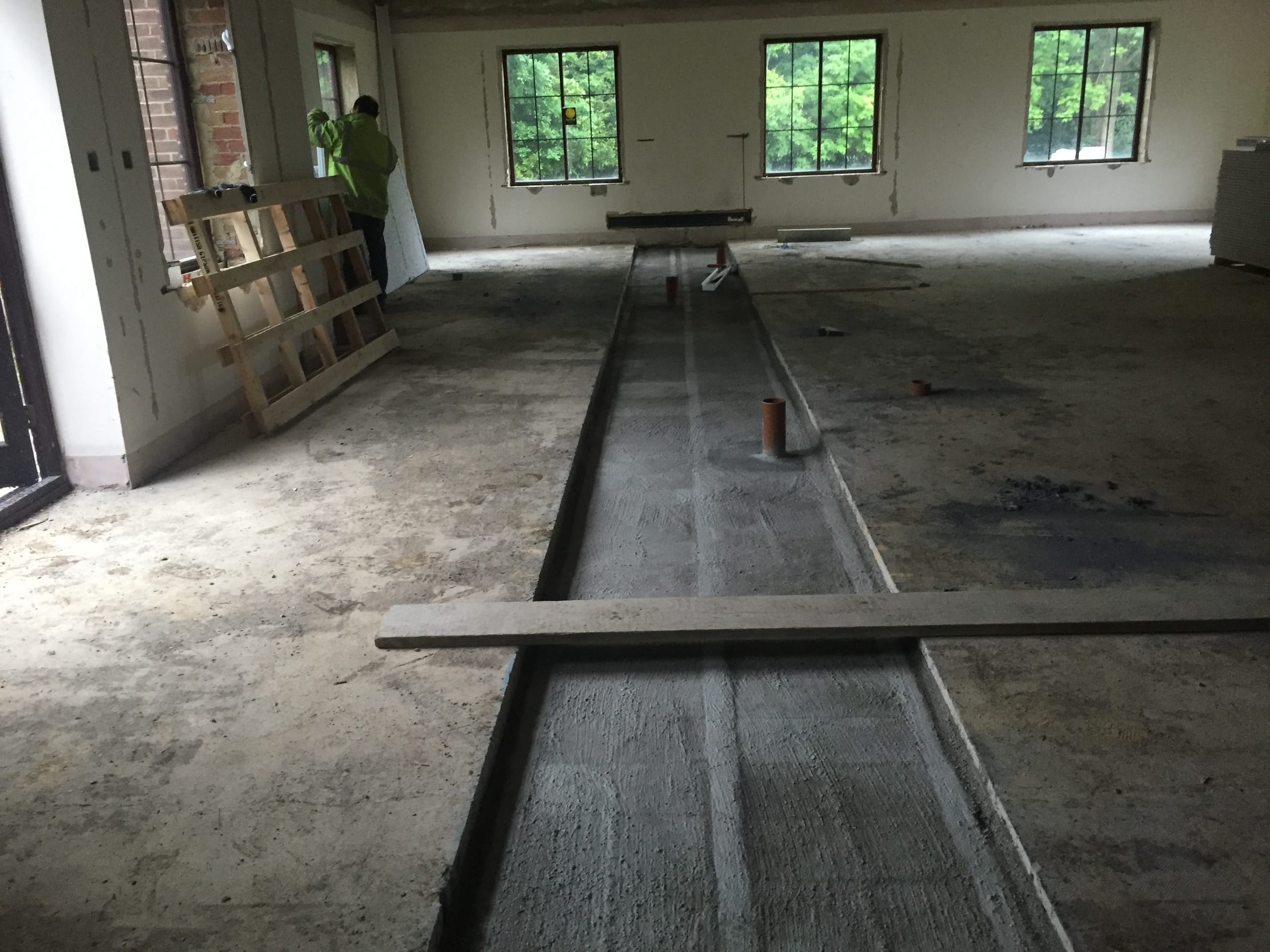Concrete floor laid over drainage in a barn conversion