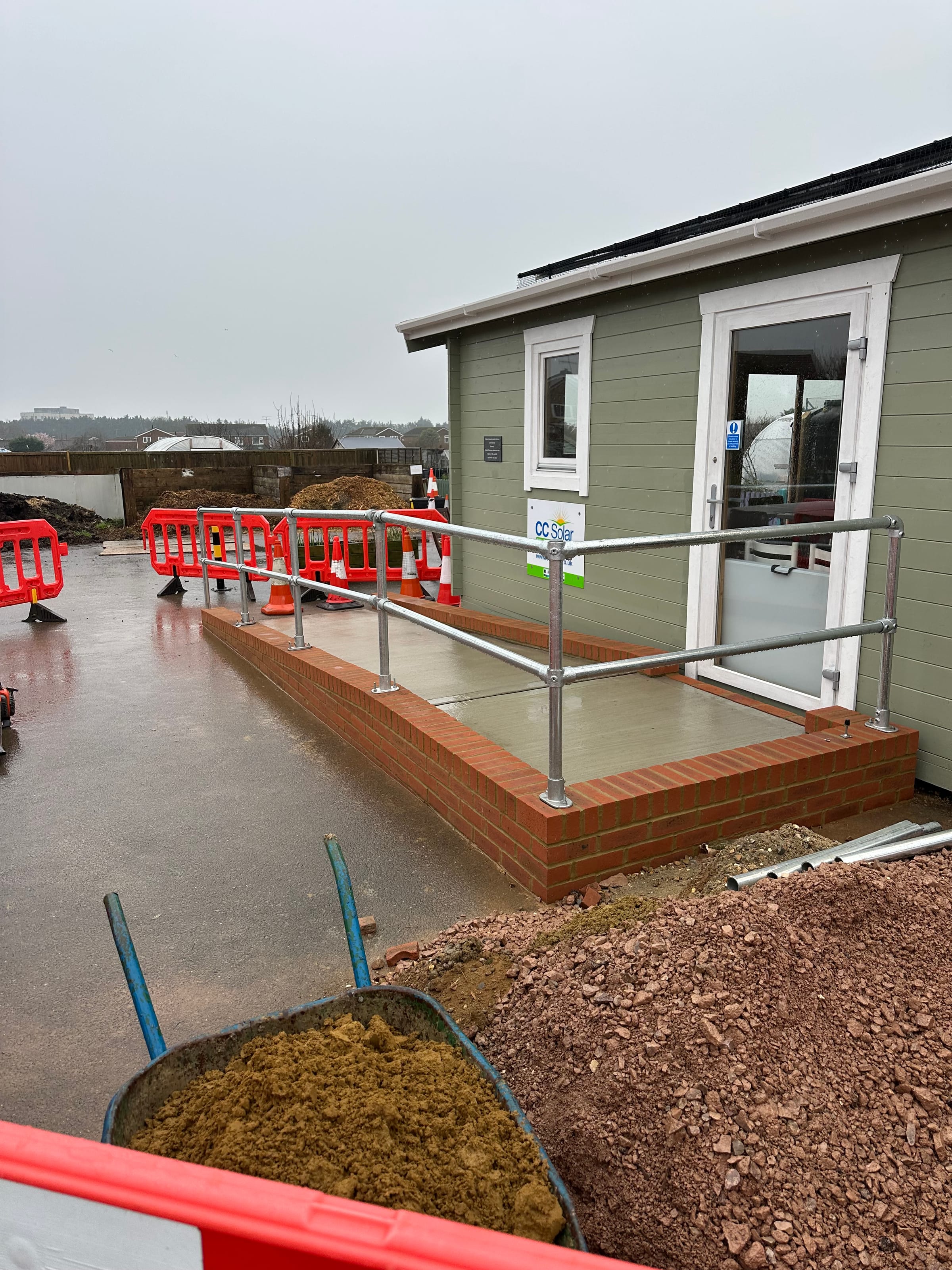 Finished access ramp with galvanised handrail