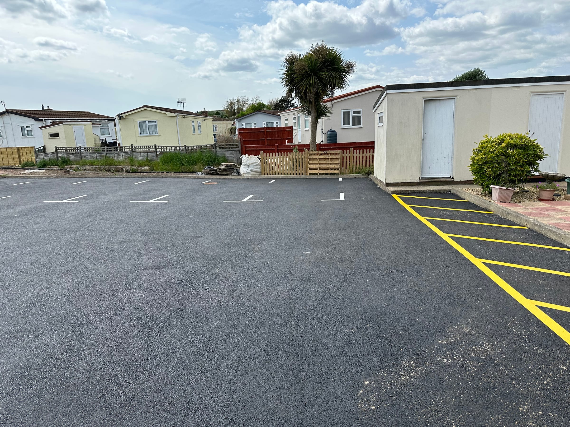 Freshly laid car park with crisp line marking