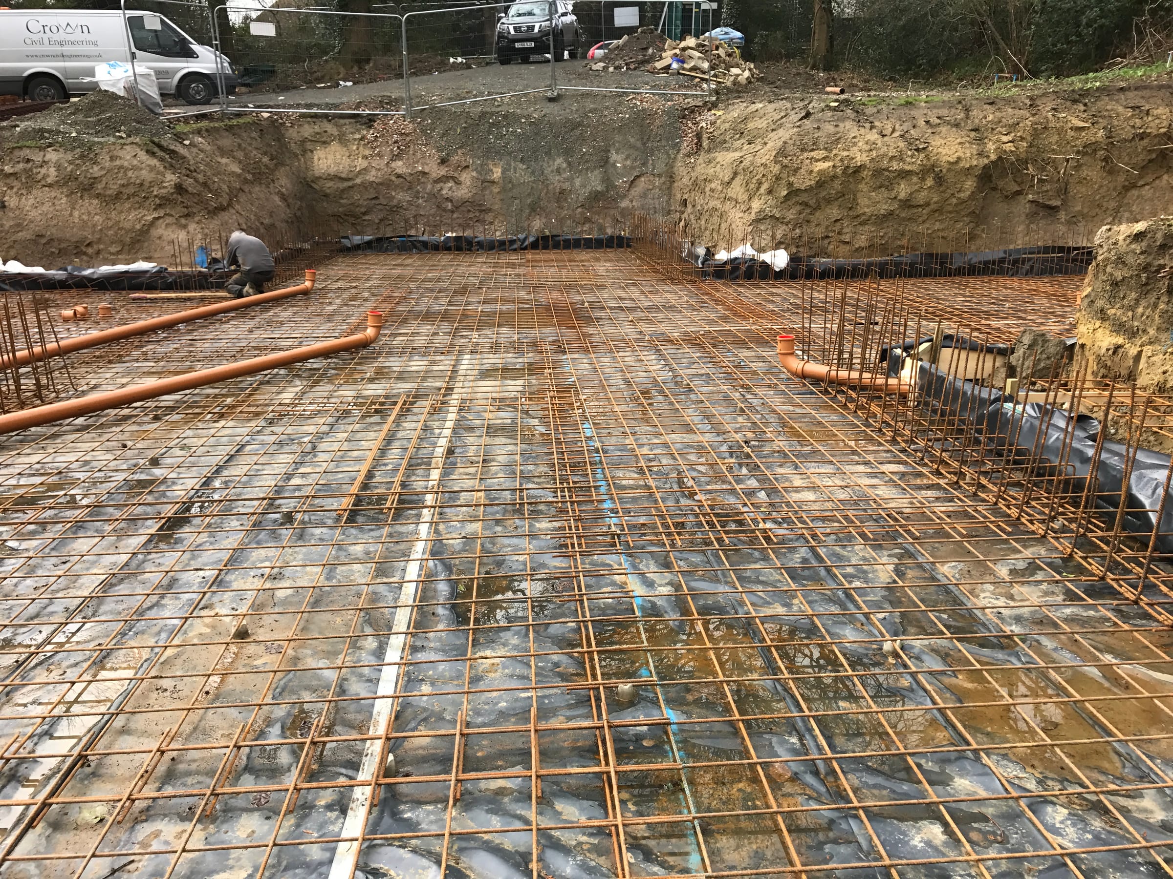 Deep excavated foundation with steel reinforcement mesh