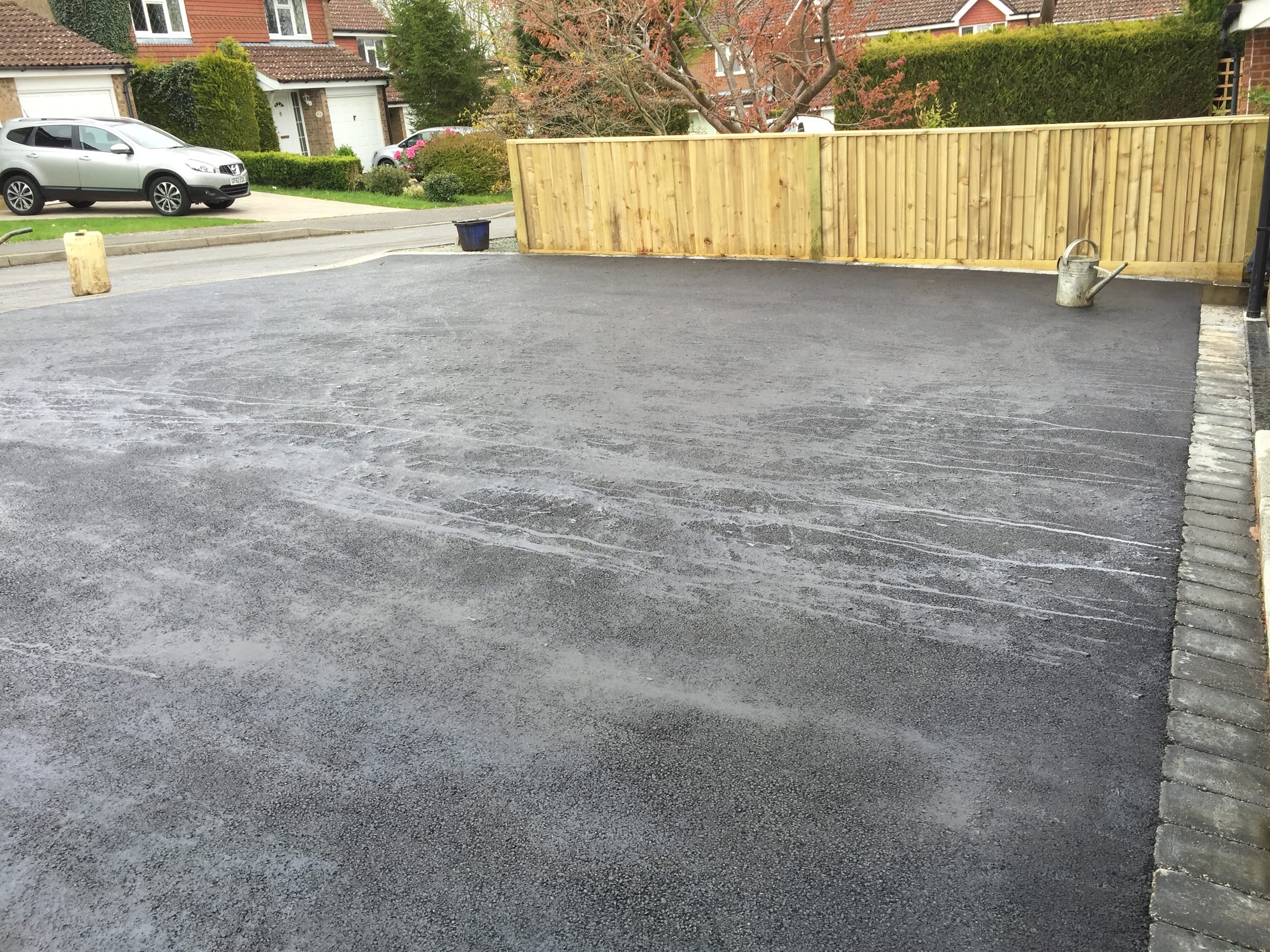Tarmac driveway with new timber fencing