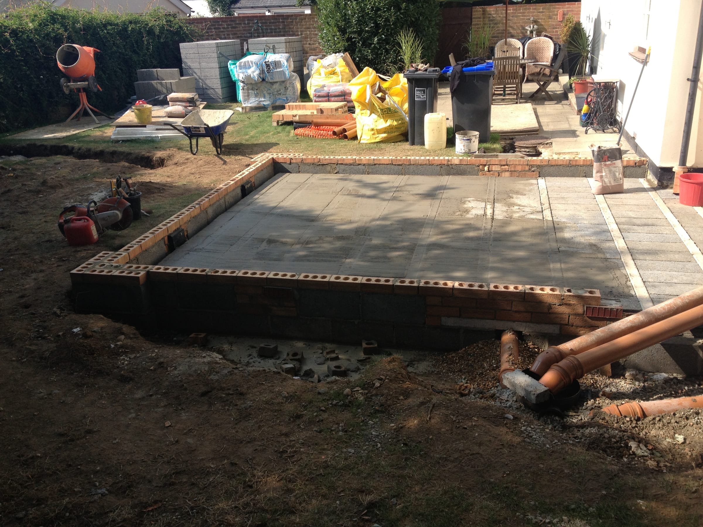 New extension foundation with brick base and concrete slab