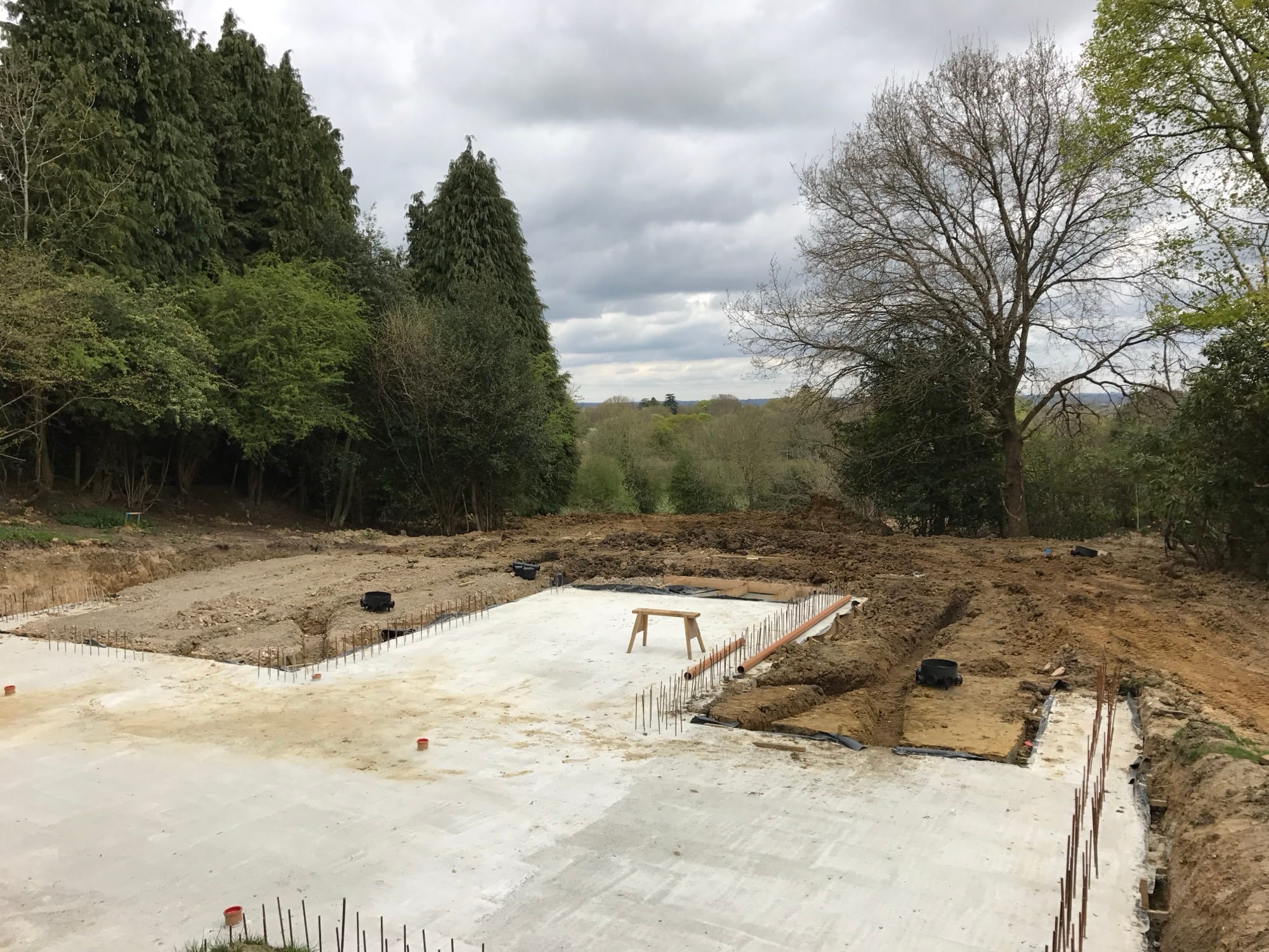 Reinforced concrete slab foundation being poured